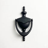 Face Fixed Urn Door Knocker
